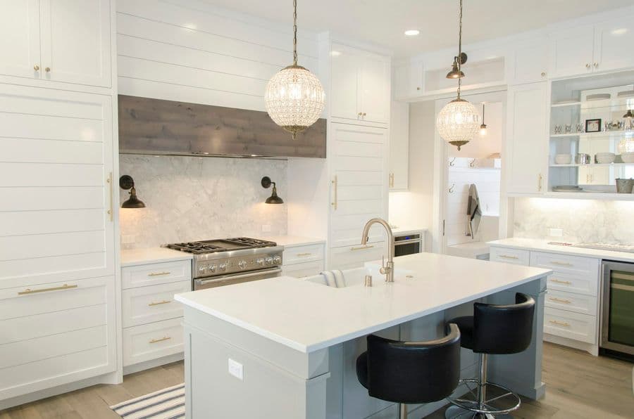 White marble island kitchen with pendant lighting