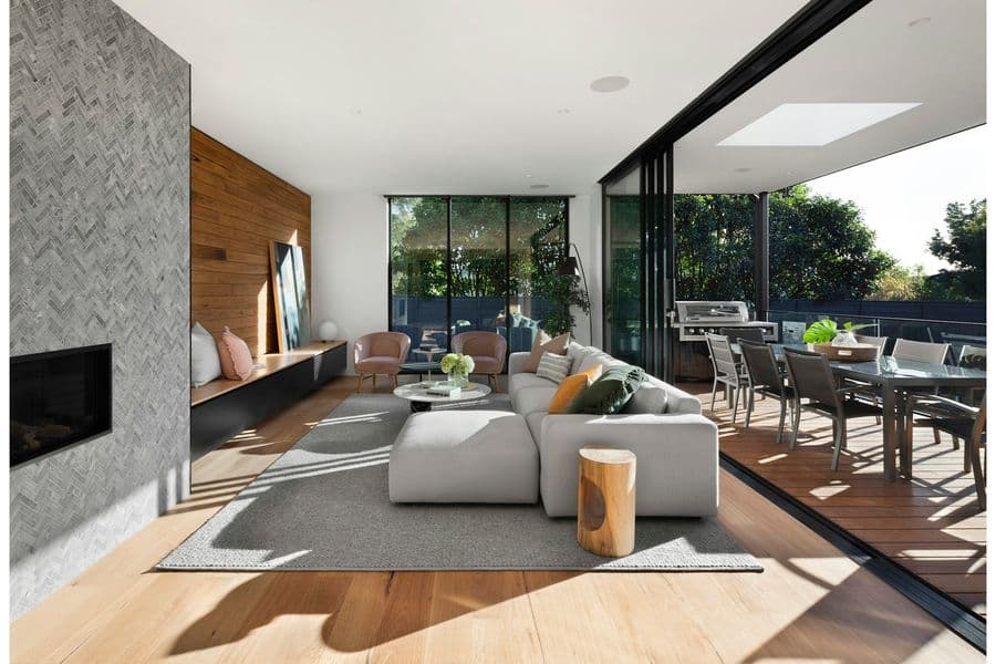 Indoor-outdoor living pavilion in afternoon light