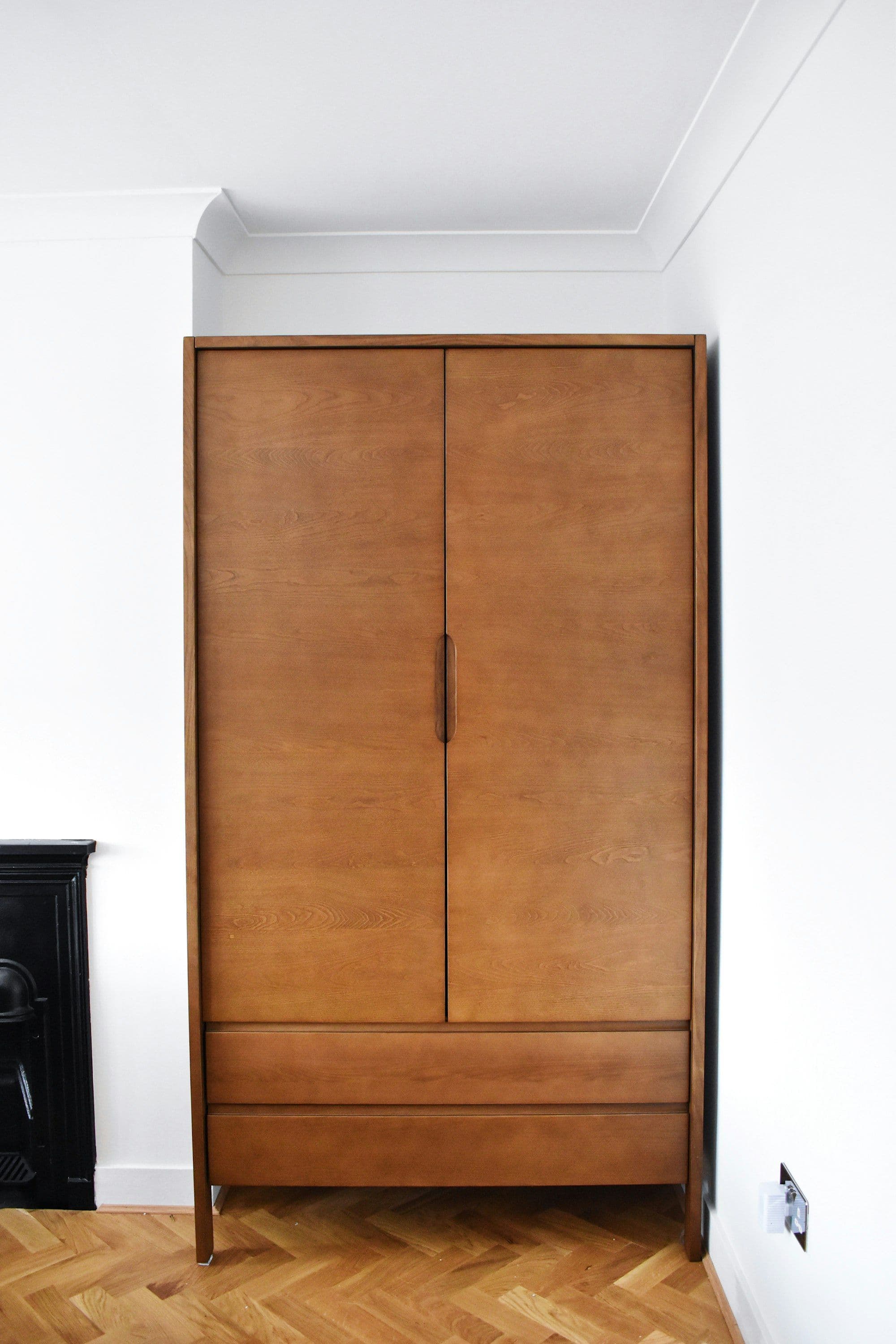 Floor-to-ceiling timber joinery, precisely fitted