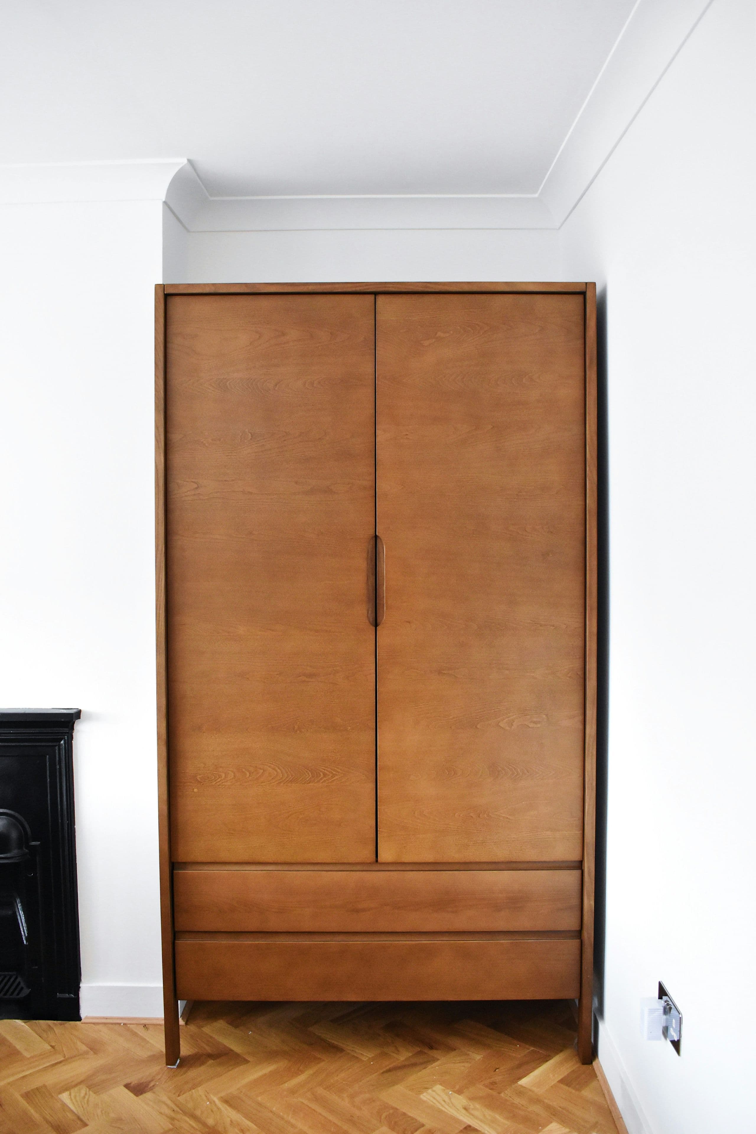 Floor-to-ceiling timber joinery, precisely fitted