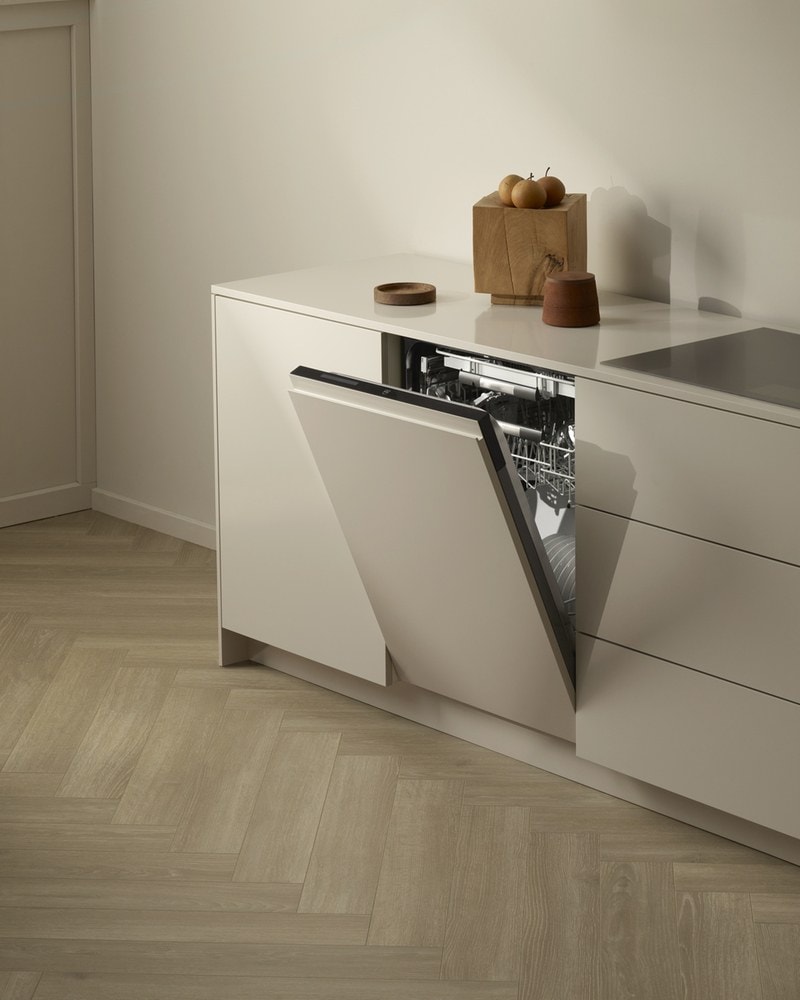V-ZUG dishwasher open in a minimalist kitchen
