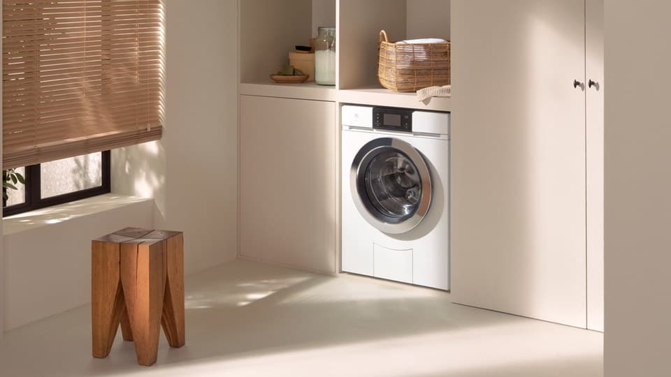 V-ZUG washing machine in a minimal laundry